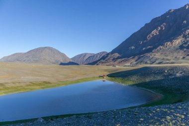 Mongolian landscapes in the Altai Mountains, wide landscape. clipart
