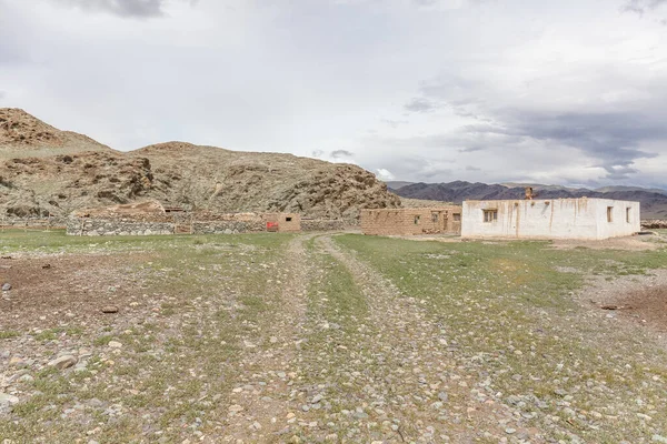 Winter dwelling and corral of nomadic people in the steppes of Mongolia.