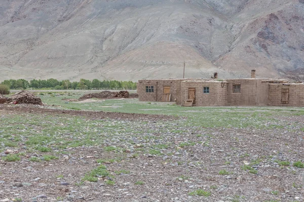 Winter dwelling and corral of nomadic people in the steppes of Mongolia.