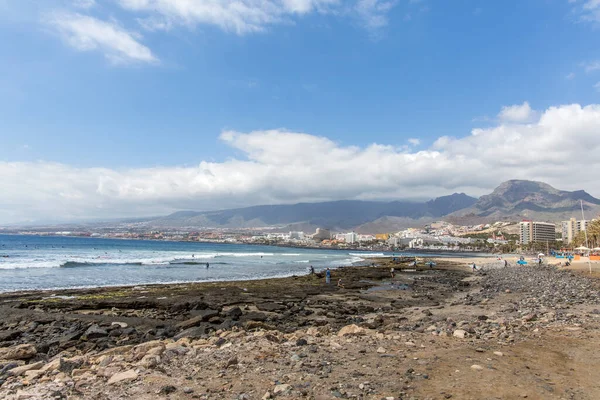 Beach in Las Americas. Beach for surfers, in Tenerife, Spain. Stone beach. Stock Photo