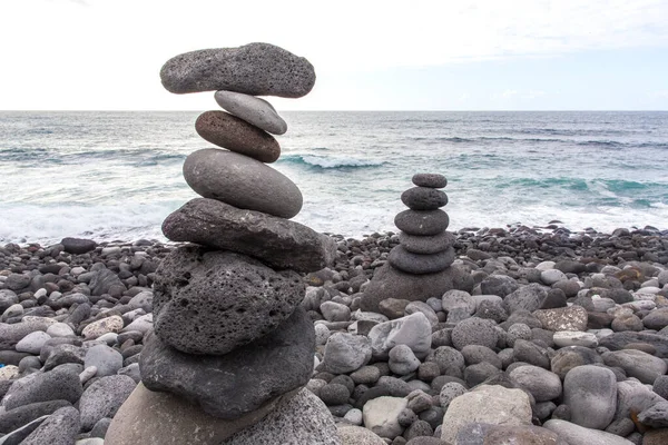 Puerto de la Cruz. Stone piles Cairns on Playa Jardin, Peurto de la Cruz, Tenerife, Canary Islands, Spain. .