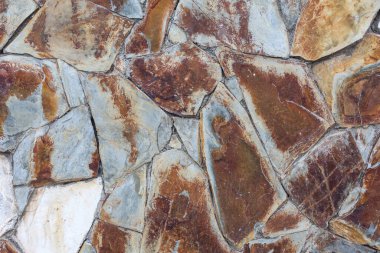 Taş dokusu. Taş döşemeli duvar. Kusursuz bir taş duvar. Kusursuz bir geçmişi var. Puerto De La Cruz, volkanik taş duvar