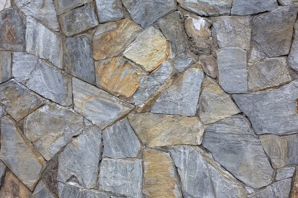 Кам'яна текстура. Кам'яна плитка текстурована стіна. Кам'яна стіна без шолома. Безшумний фон. Puerto De La Cruz, вулканічна кам "яна стіна. — стокове фото