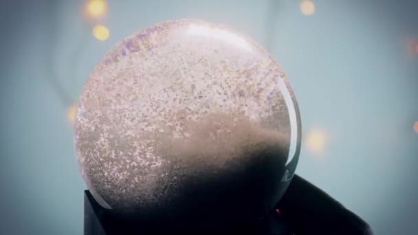 Navidad Animación Bola Nieve Mano Una Guirnalda Luces Brilla Fondo — Vídeo de stock