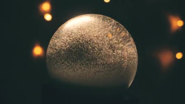 Christmas Snow Globe Animation Hand Garland Lights Glows Background — 비디오