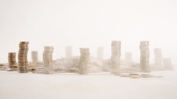 The concept of money. Columns of gold coins in the form of skyscrapers or Stonehenge. — 비디오