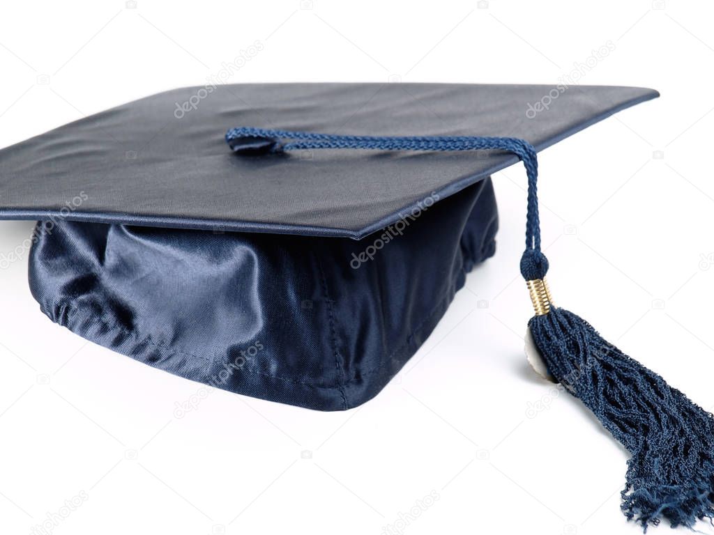 Graduation cap over white background