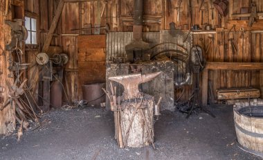 old blacksmith forge at the old silver mining town Calico California clipart