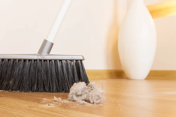 Sweeping Dust Black Broom Wooden Floor — Stock Photo, Image