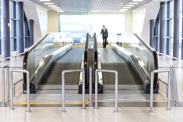 Movable conveyor belt in airport, escalator line