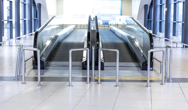 Movable conveyor belt in airport, escalator line