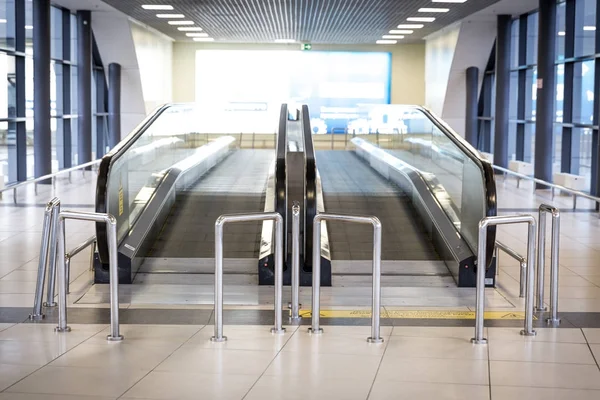 Movable conveyor belt in airport, escalator line