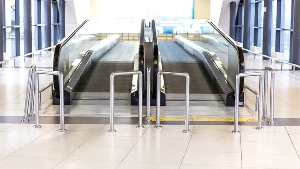 Movable conveyor belt in airport, escalator line