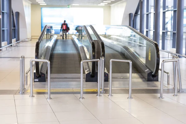 Movable conveyor belt in airport, escalator line