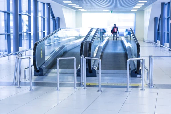 Movable conveyor belt in airport, escalator line