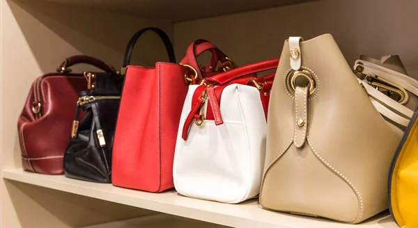 Collection of handbags in woman`s closet — Stock Photo, Image