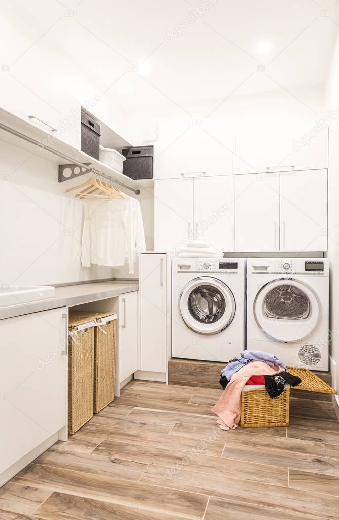 Laundry room with basket and dirty clothes