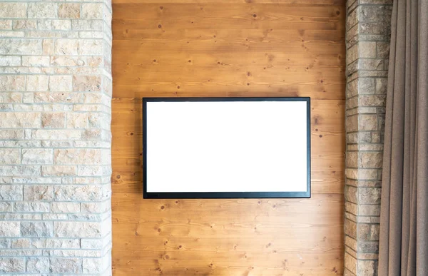 벽돌 과 복사 공간 이 있는 목조 벽에 있는 빈 현대식 평면 화면 TV — 스톡 사진
