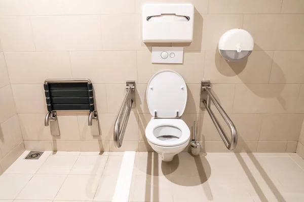 Public restroom for disabled people with special equipment — Stock Photo, Image