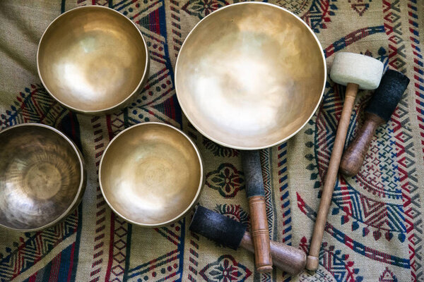 Accessories for sound massage. Tibetan singing bowls treatment