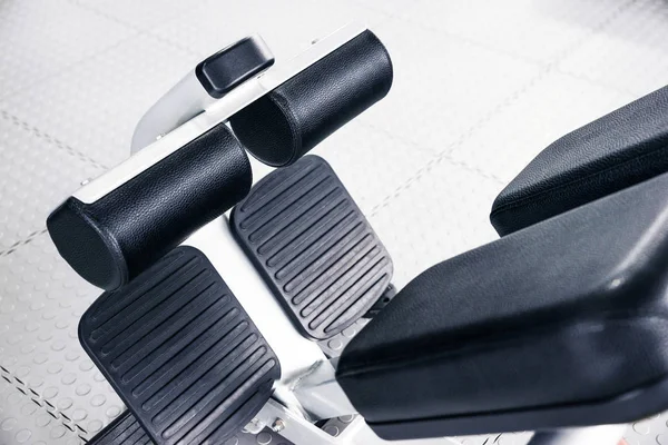 Abdominal machine inside a gym, fitness concept — 스톡 사진