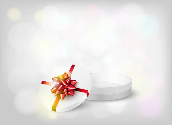 Nouvel an fond avec boîte cadeau ouverte et arc rouge — Image vectorielle