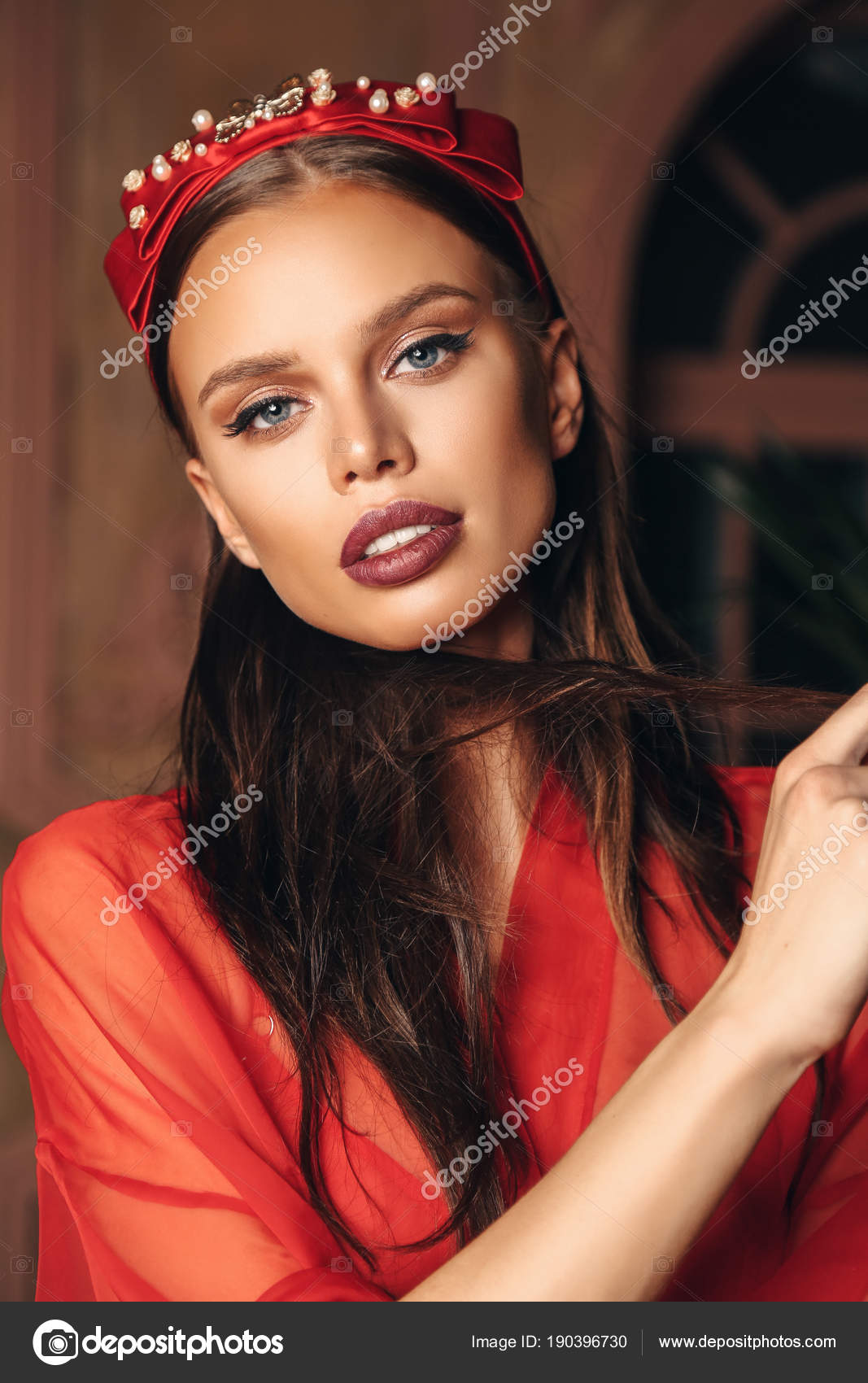 Beautiful Woman With Natural Hair And Bright Makeup In Luxurious