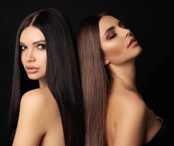 Mulheres bonitas com cabelo escuro bonito longo — Fotografia de Stock