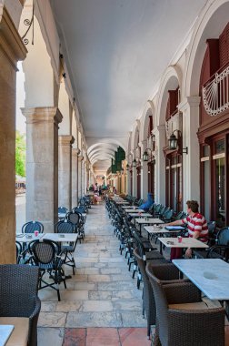 A fashionable arched cafe of Liston in Corfu, Greece