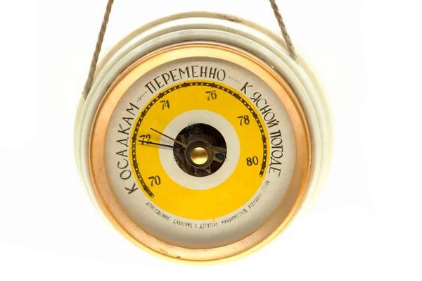 Unbranded vintage barometer, the English translation of the text on the top is Rain, Change and Fair. The English translation of the text on the bottom is Atmospheric pressure in tens of mmHg