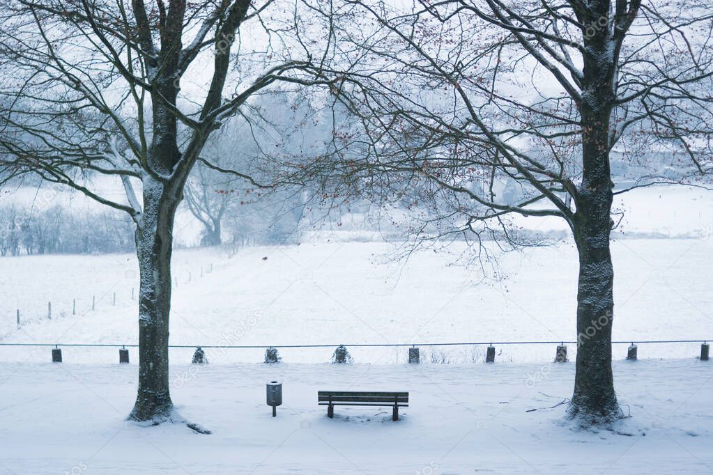 Snowy bench at Lousberg in Aachen, Germany