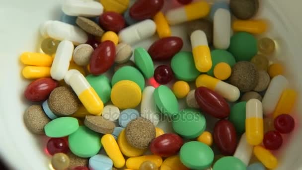 Taking a spoon of pills — Stock Video