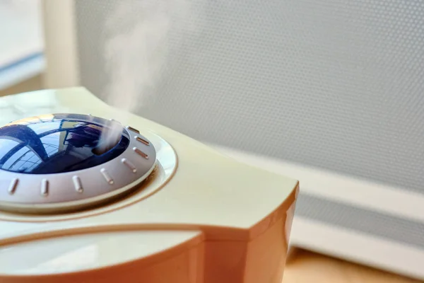 Top view of the convector and working humidifier standing together. — Stock Photo, Image