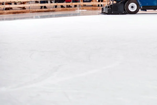 Ice resurfacing machine ,Ice resurfacer, resurfacing the ice rink in the central park of the town.