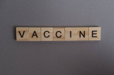 Vaccine race depicted in words on background. Novel Coronavirus originating in Wuhan, China. Coronavirus 2019-nCoV concept.