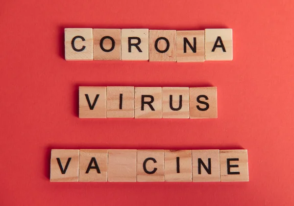 Vaccine race depicted in words with missed letter on background. Novel Coronavirus originating in Wuhan, China. Coronavirus 2019-nCoV concept.