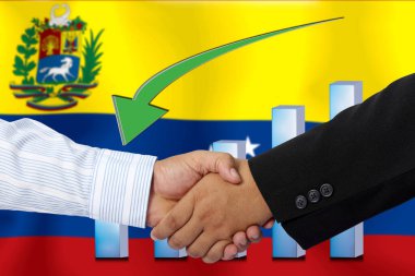Arkaplan olarak Venezuela bayrağı ile el sıkışmak ya da sözleşmek.