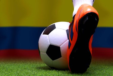 Kolombiya bayrağı ve futbol topu. Spor kavramı..
