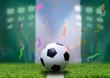 Nijerya bayrağı ve futbol topu. Spor kavramı.