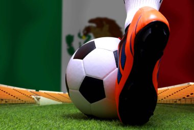 Futbol oyuncusunun bacakları ve ayakları kapalı yeşil çimlerde yürür ve Meksika bayrağının arka planında maç yapmaya hazırdır..