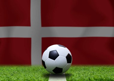 Danimarka bayrağı ve futbol topu. Spor kavramı.