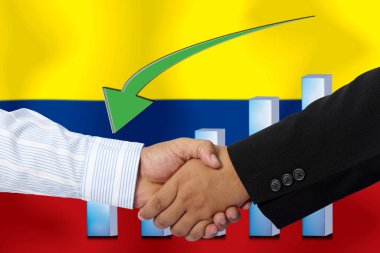 Arkaplan olarak COLOMBIA bayrağı ile el sıkışma veya sözleşmesi.