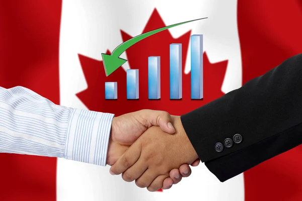 Uścisk Dłoni Lub Umowa Wraz Banderą Kanady Jako Tło — Zdjęcie stockowe