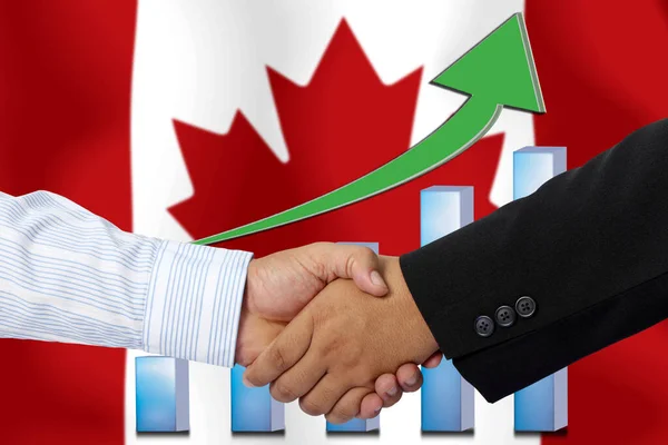 Uścisk Dłoni Lub Umowa Wraz Banderą Kanady Jako Tło — Zdjęcie stockowe
