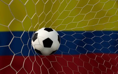 Kolombiya bayrağı ve futbol topu. Spor kavramı..