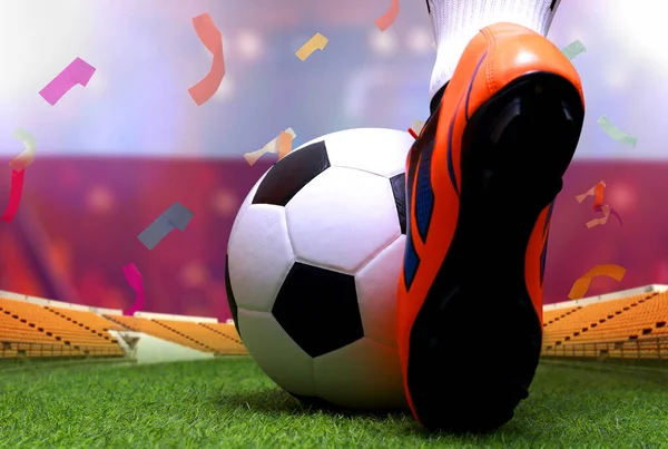 Close up legs and feet of soccer player or football player walk on green grass ready to play match on national Poland flag background.