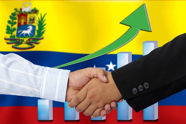 Handdruk Contract Samen Met Vlag Van Venezuela Als Achtergrond — Stockfoto