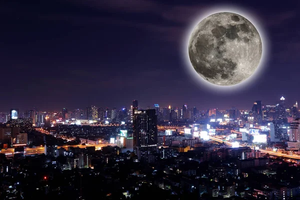 The View city at night with full moon.