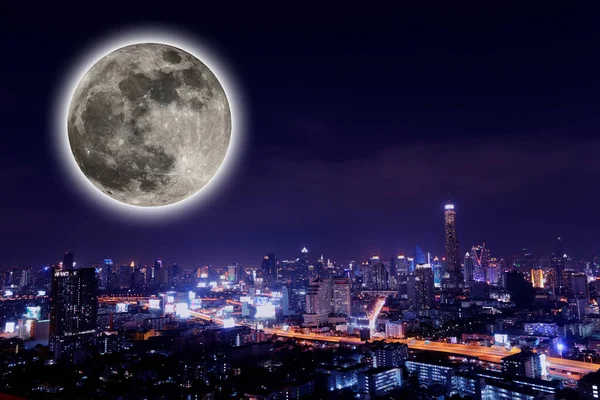 The View city at night with full moon.