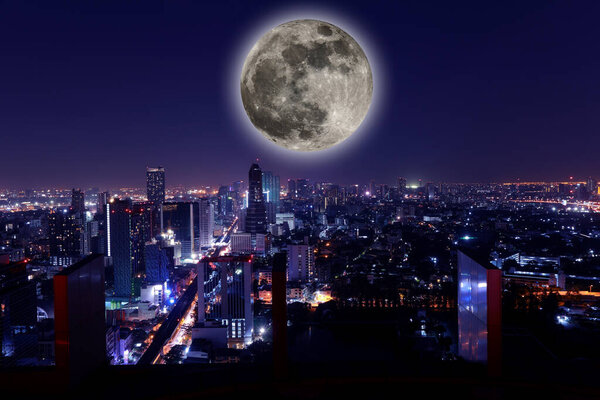 The View city at night with full moon.